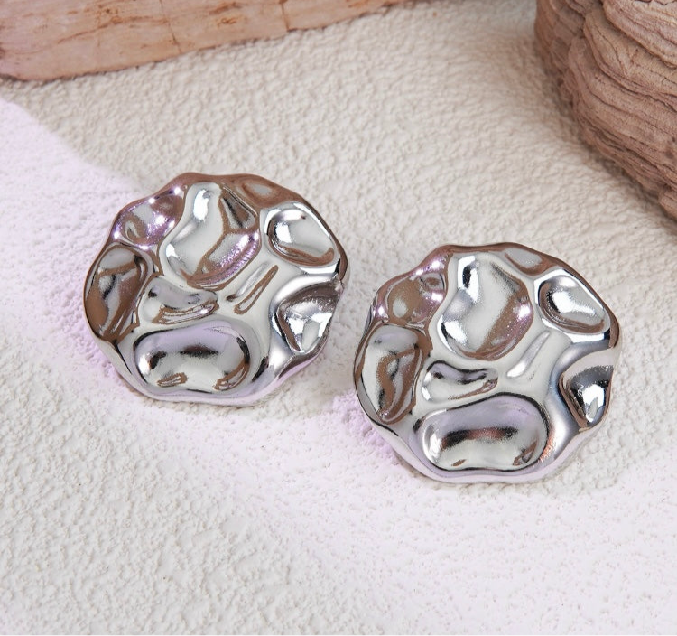 The Mercury Ripple Silver Studs