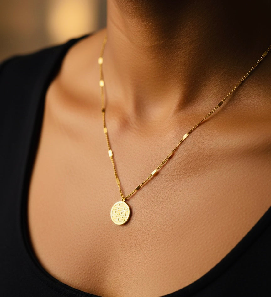 Diamond studded round charm necklace