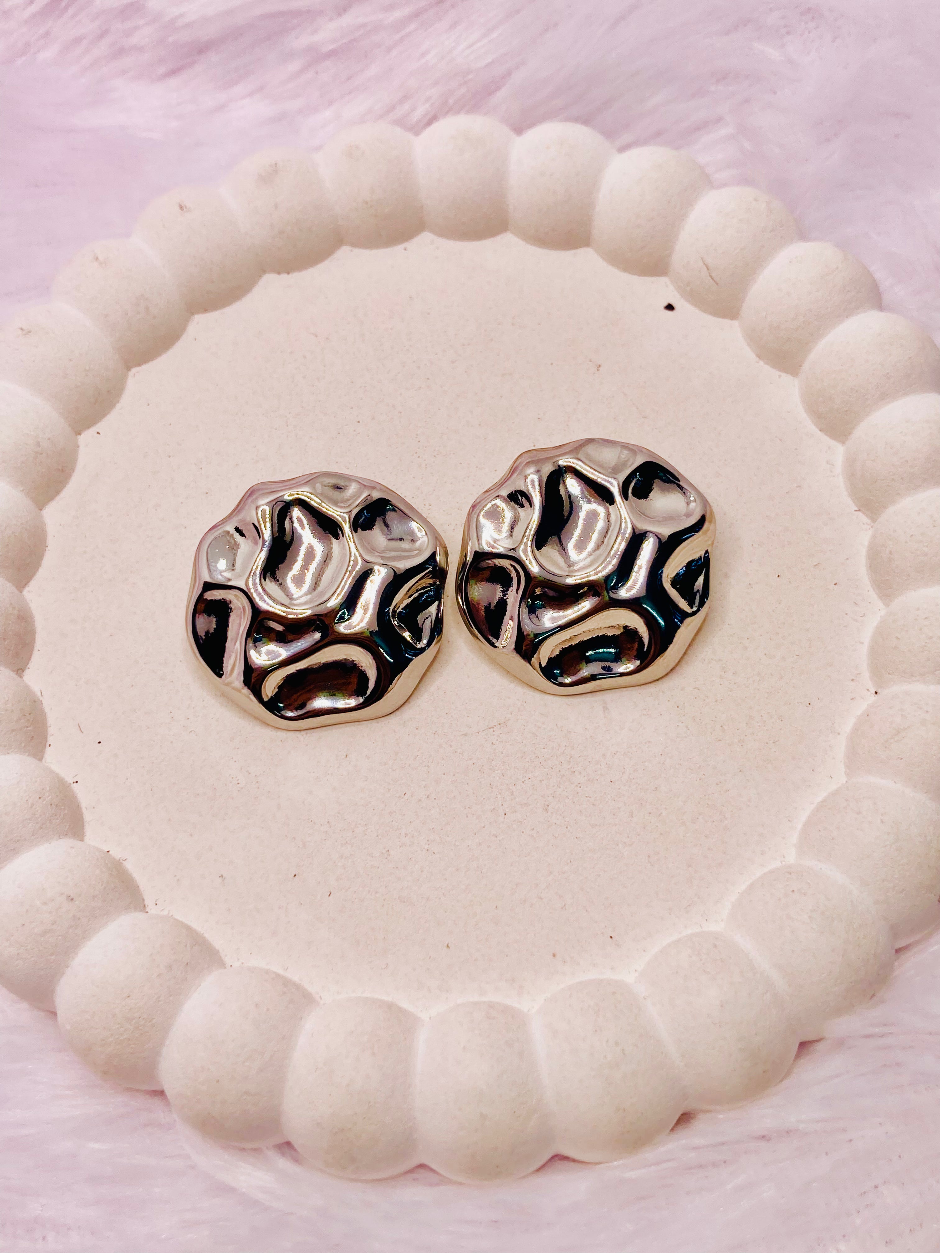 The Mercury Ripple Silver Studs